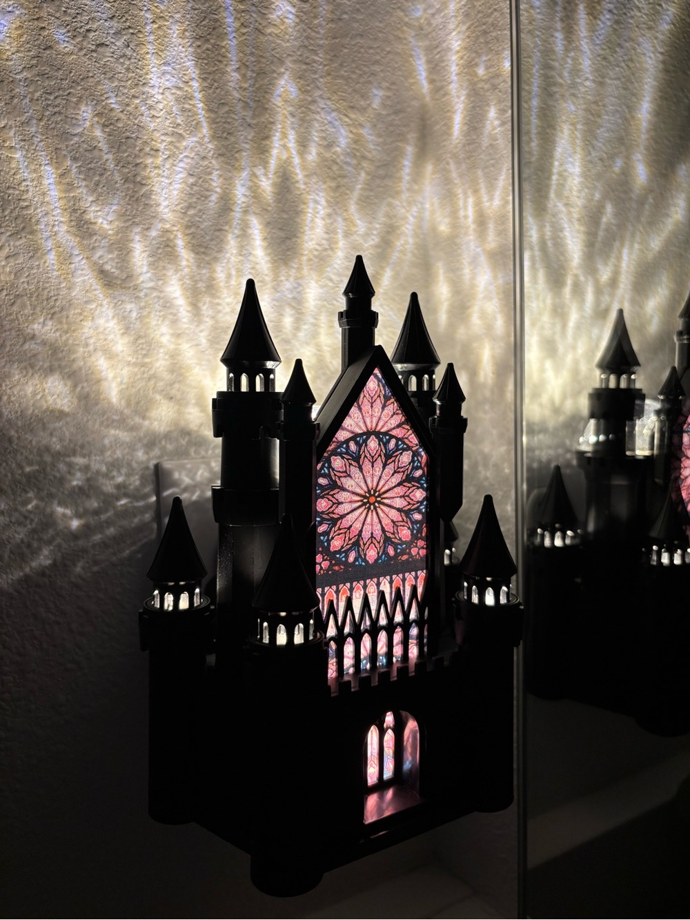 Black Castle Stained-Glass Wall Accent with Pink Light